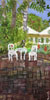 Garden with White Chairs